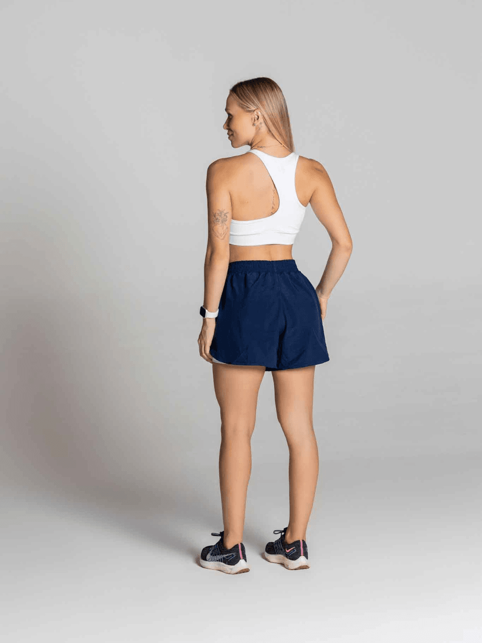 Short soltinho de tactel com bermuda interna e bolso