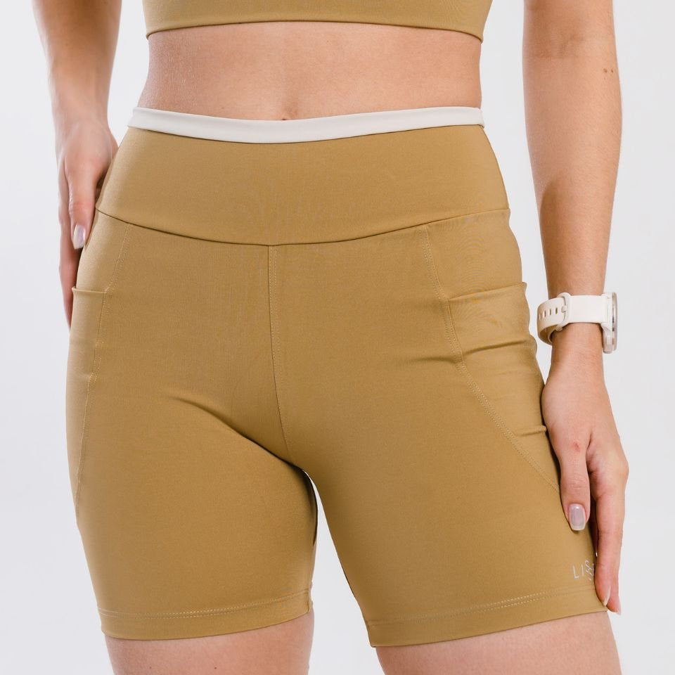 Bermuda Feminina de Alta Compressão com Bolsos Laterais e Proteção UV50+