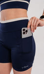 Bermuda Feminina de Alta Compressão com Bolsos Laterais e Proteção UV50+