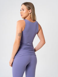 Conjunto Fitness Feminino Peach – Regata Coladinha + Calça Flare de Média Compressão