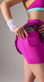 Saia short roxa de beach tennis com bolso interno na lateral