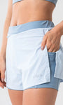 Short Feminino com Bermuda Interna e Bolsos