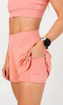 Short soltinho com bermuda interna e bolsos laterais