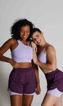 Short fitness com bermuda interna e bolsos laterais