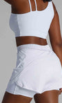 Short fitness com bermuda interna e bolsos laterais