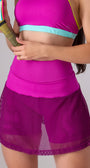 Saia short roxa de beach tennis com bolso interno na lateral