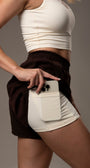 Short soltinho de tactel com bermuda interna e bolso