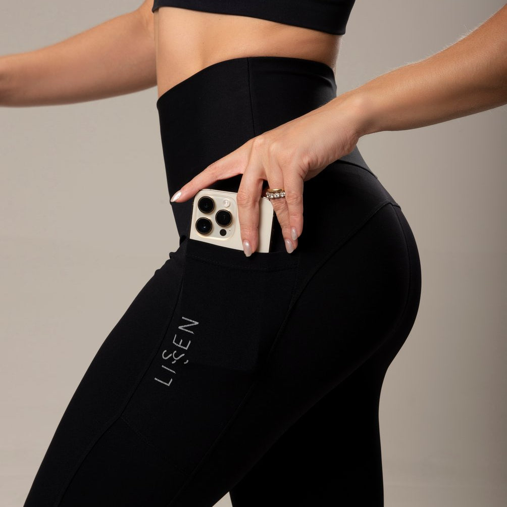 Legging fitness de média comprensão com dois bolsos laterais