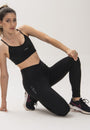 Legging cós alto cruzado de alta compressão e dois bolsos laterais | Tecnologia Emana ®