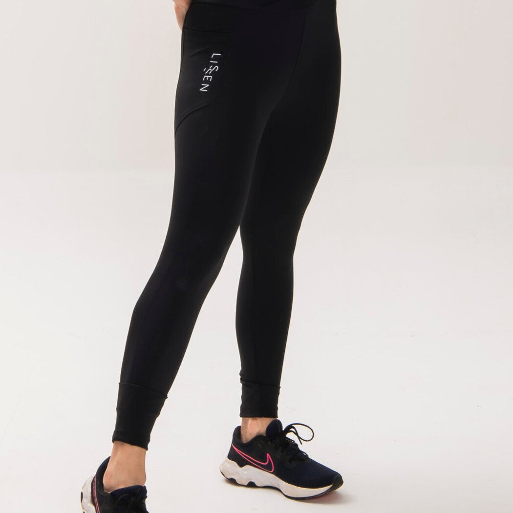 Legging cós alto cruzado de alta compressão e dois bolsos laterais | Tecnologia Emana ®