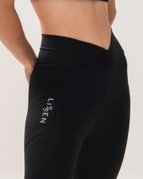 Legging cós alto cruzado de alta compressão e dois bolsos laterais | Tecnologia Emana ®