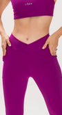 Legging cós alto cruzado de alta compressão e dois bolsos laterais | Tecnologia Emana ®