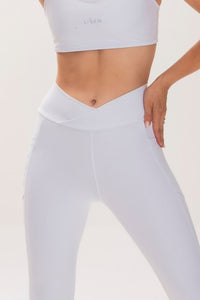 Legging Cós Alto Cruzado Alta Compressão com Bolsos Laterais – Tecnologia Emana®