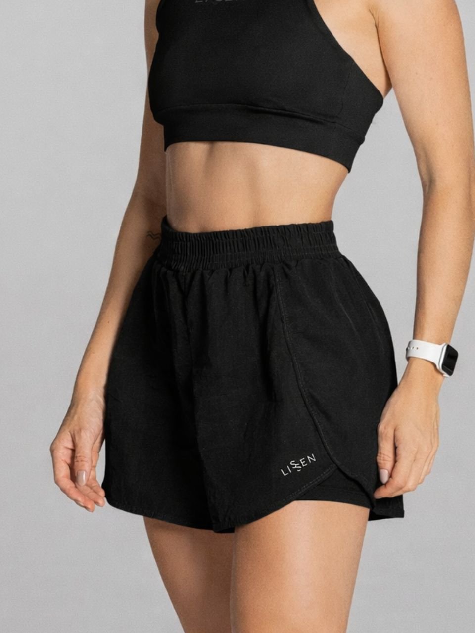 Short soltinho de tactel com bermuda interna e bolso